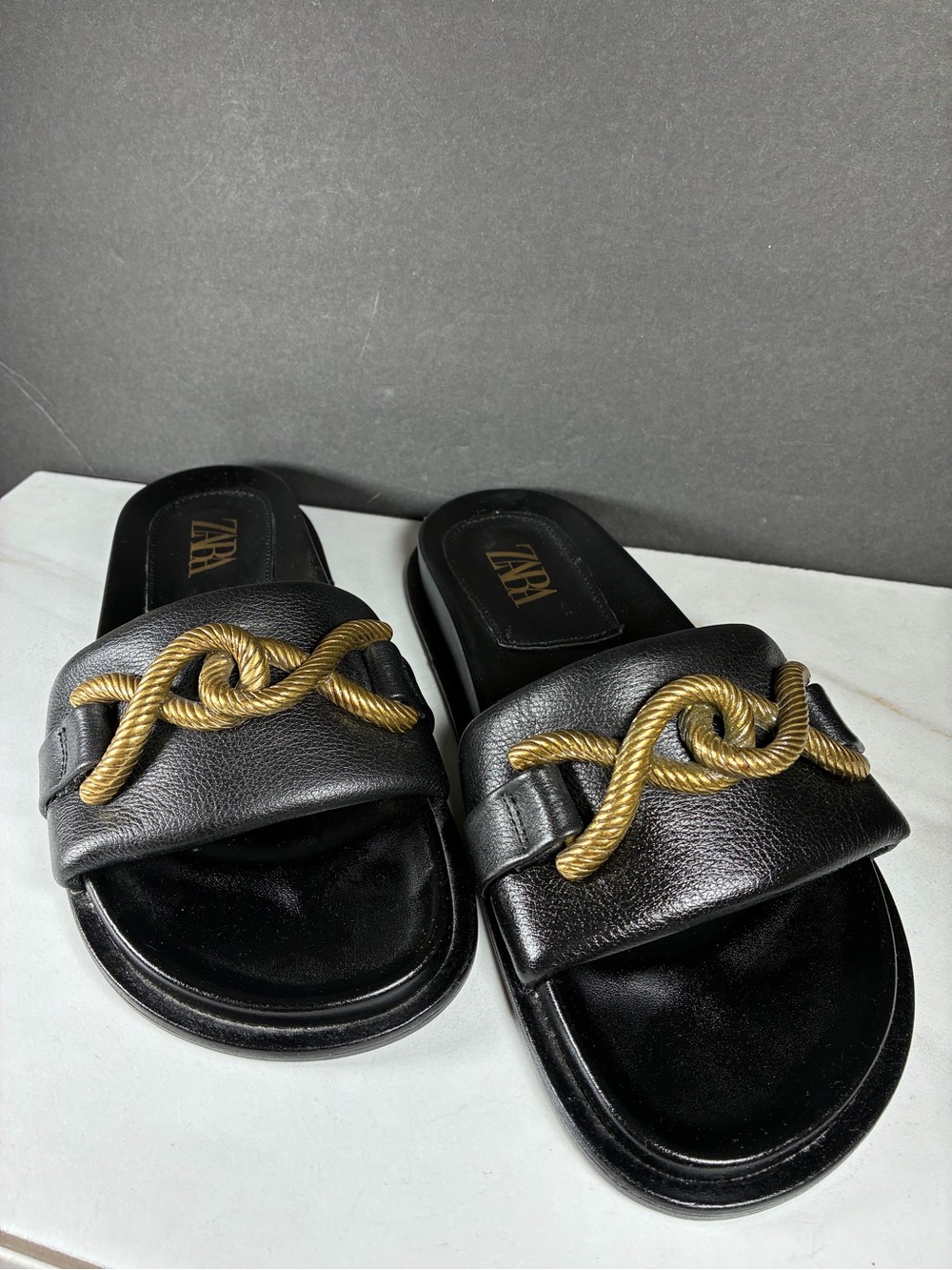 Zara Black Leather Slide Sandals with Gold Tone Twist Rope Knot Detail
